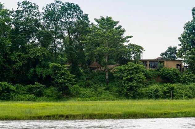 Into The Wild Eco Resort - Photo4