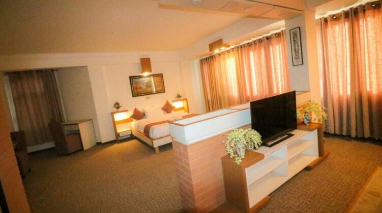 Times Square Rooms and Apartments - Photo3