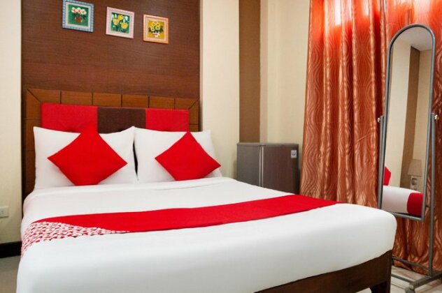 OYO 153 Monclaire Suites - Photo2