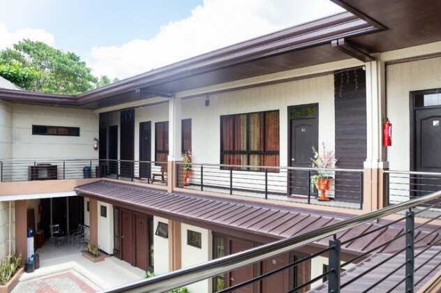OYO 153 Monclaire Suites - Photo5