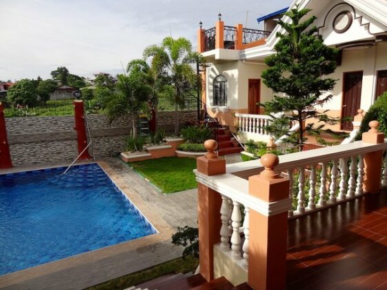 The Executive Villa Inn & Suites - Photo2