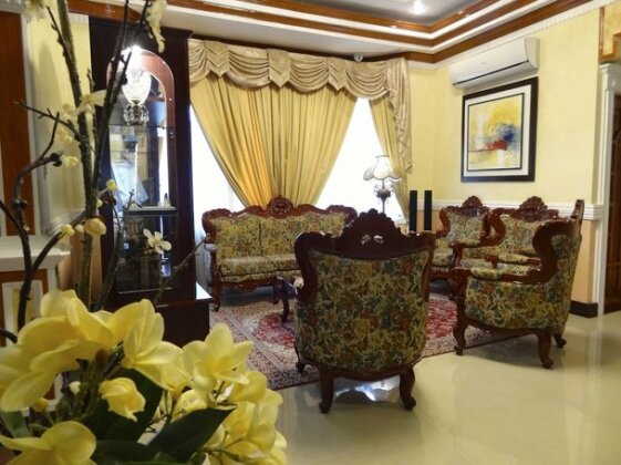 The Executive Villa Inn & Suites - Photo5