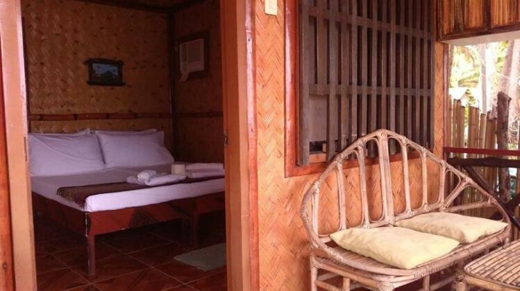 Talindak Beach Cottage - Photo2