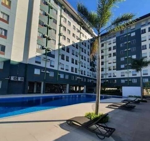 Condo Hotel near Airport with Pool