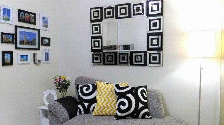 Cozy Condo at Wind Residences - Photo2