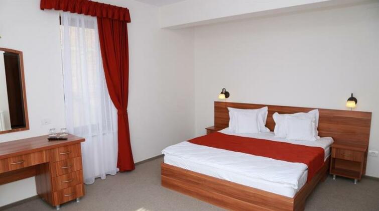 Pensiunea Comfort - Photo4