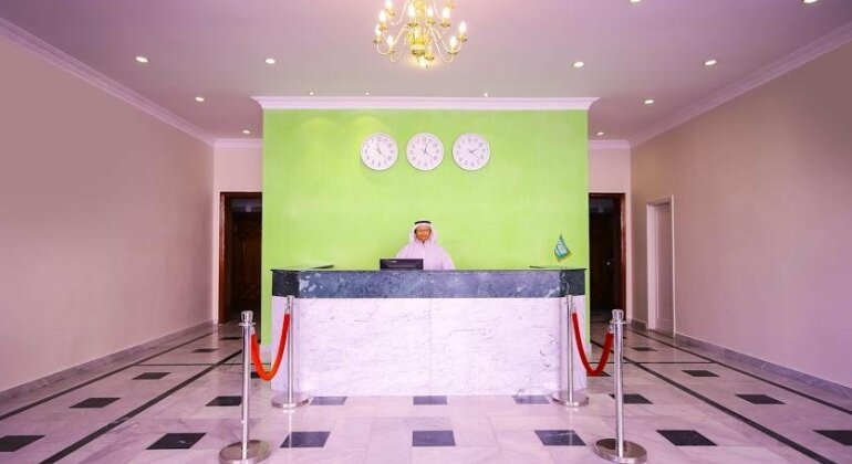 Rose Garden Hotel Suites - Photo2