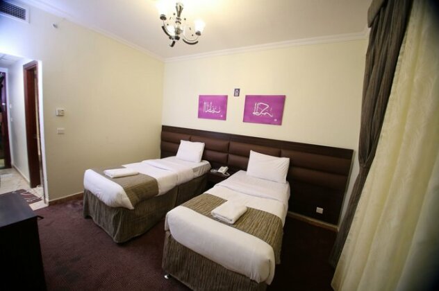 Guest Oasis Hotel - Photo2