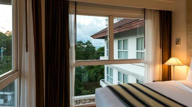 One bedroom at RCG Suites Pattaya - Photo4