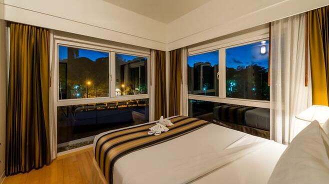 One bedroom at RCG Suites Pattaya - Photo5