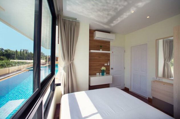 The Lago Apartments by TropicLook - Photo3
