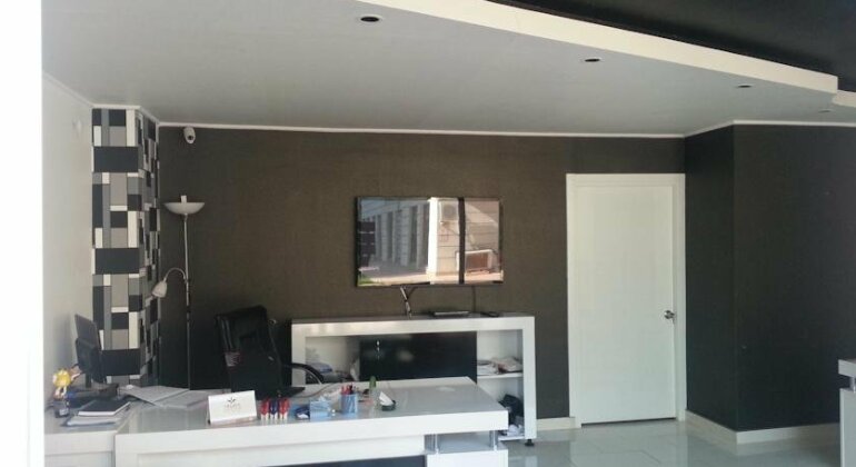 Deluxia Suites - Photo2