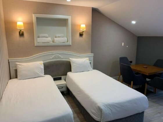 White Golden Suite Hotel - Photo2