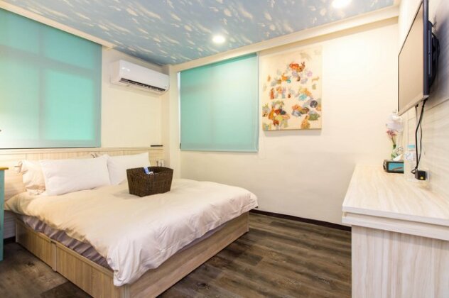 Mei Zhou Hotel - Photo4