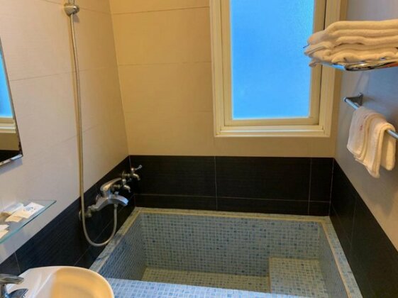 Tang Zai Cheng Hotel - Photo2