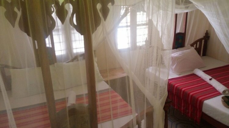 Blue Earth Beach Bungalow - Photo3