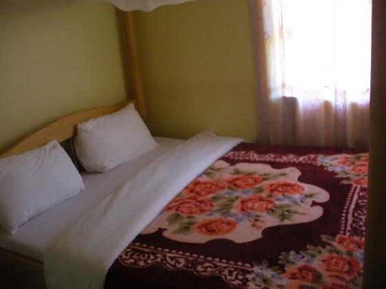 Jambo Rooms - Photo5