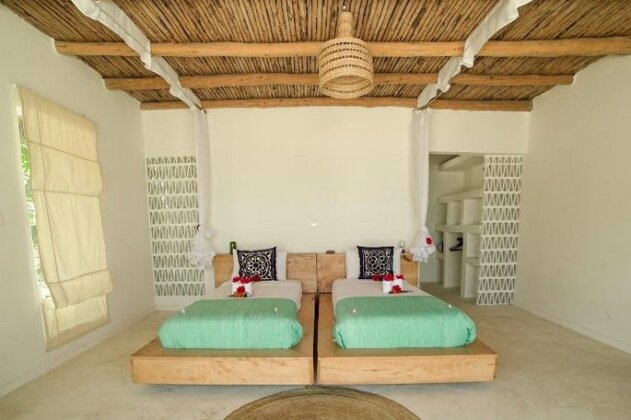 Zanbluu Beach Hotel - Photo5