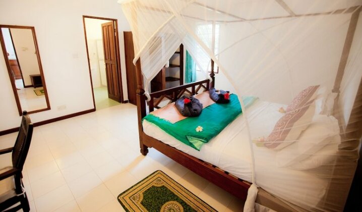 Flame Tree Cottages - Photo5