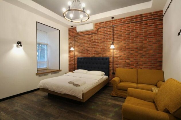 Loft Apartments on Desyatinnyy per - Photo4