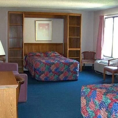 Compare Inn and Suites - Photo5