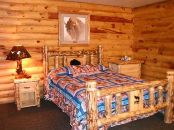 Wolf Den Log Cabins and RV Park