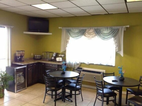 Executive Inn Tulia - Photo5