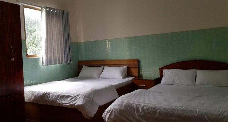 Que Huong Coconut Hotel - Photo4