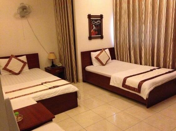 Bloom Hotel Da Nang - Photo2