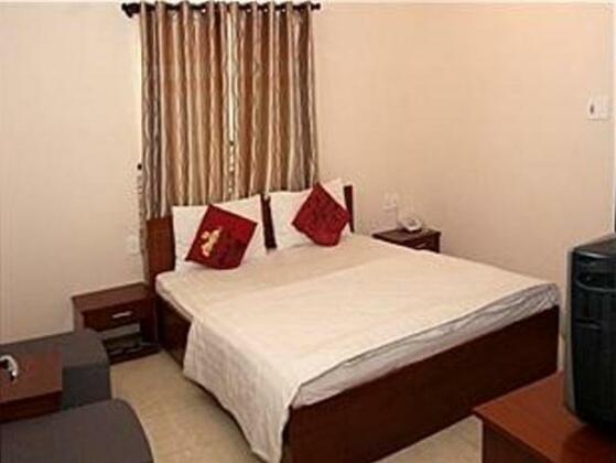 Bloom Hotel Da Nang - Photo4