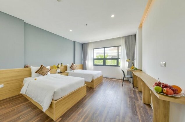 Magnolia Hotel Da Nang - Photo4