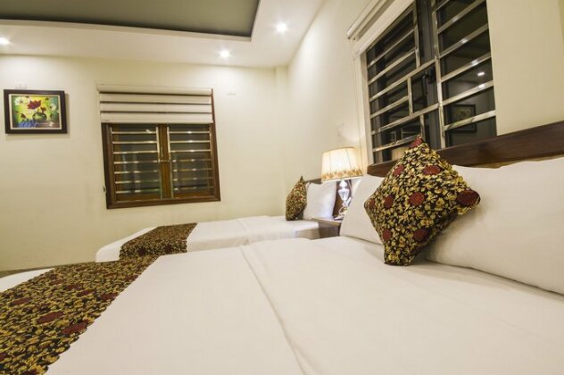 OYO 415 Nice House Hotel - Photo5