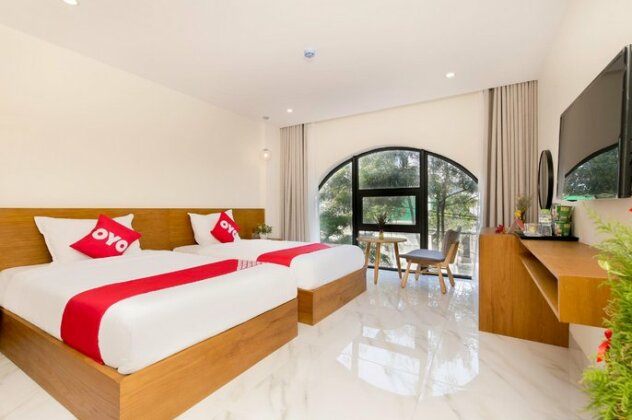 OYO 541 Maple Suite Hotel - Photo5