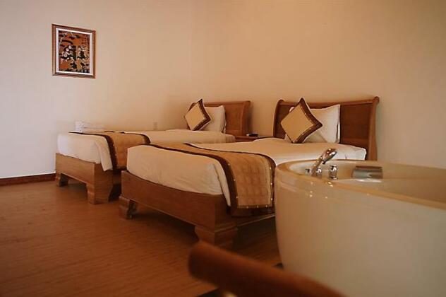 Trang An Beach Resort - Photo4