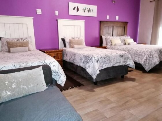 Flamboyant Guesthouse - Photo2