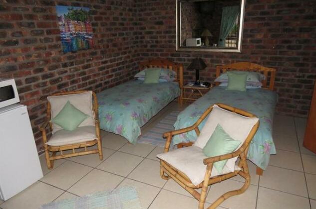 Coral Tree Guest Rooms - Photo4