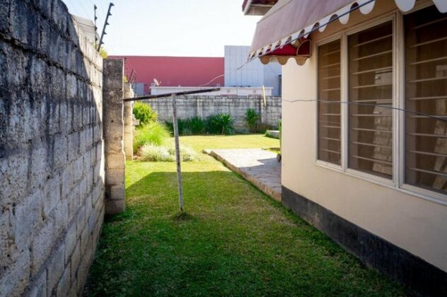 Spacious & charming 3 bedroom apartment with lush private garden